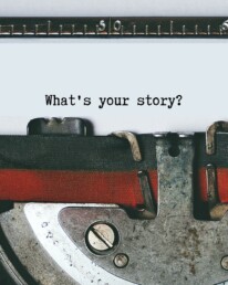 Close up of a typewriter with the words 'What your story?' written on the paper